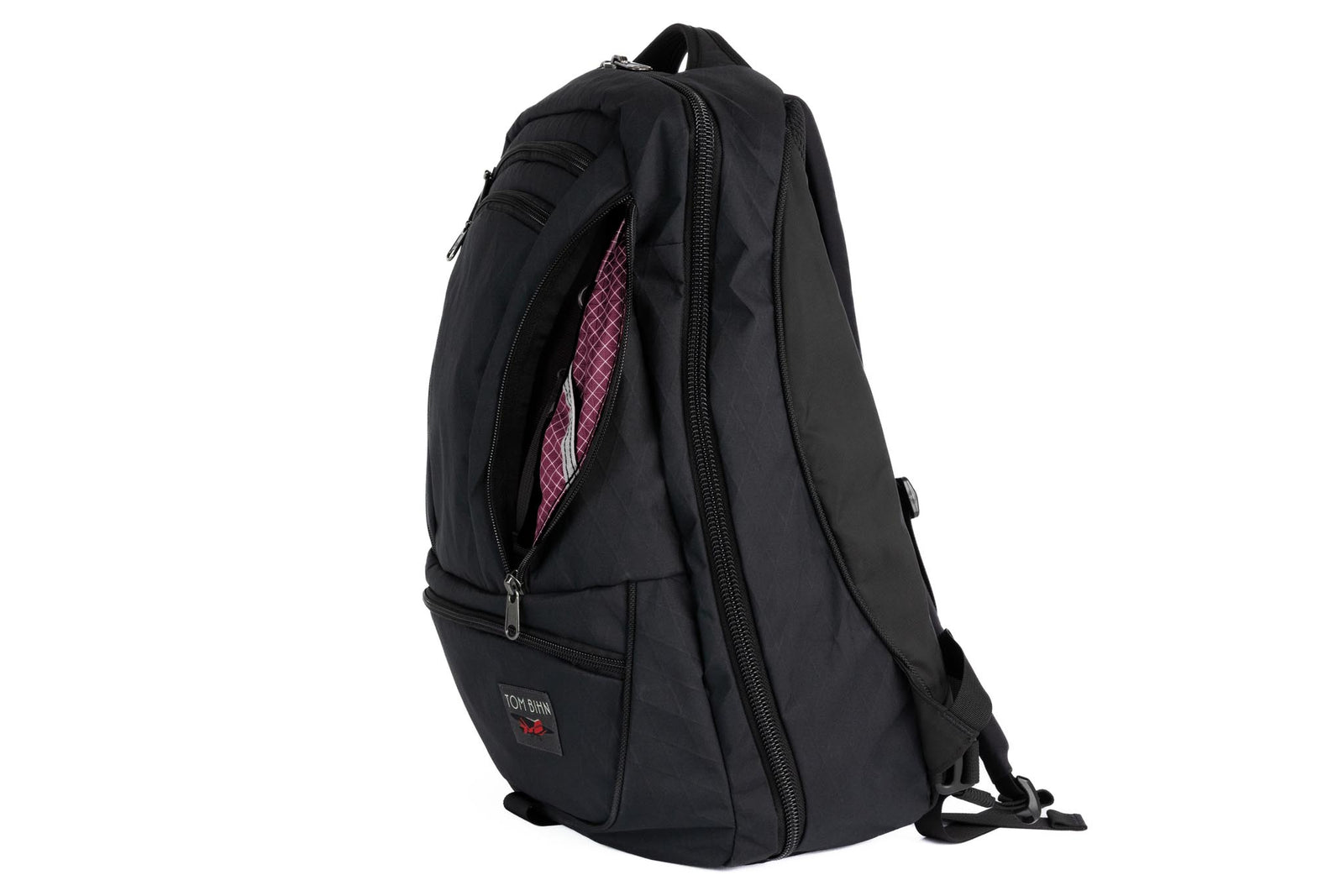 visible variant TB0121-BX5D^^Synik 30 in Black X-Pac with Acai (dark berry purple with white grid) interior.