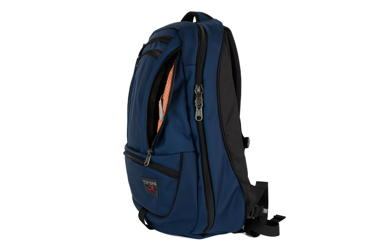 visible variant TB0121-DK3D^^A side shot of the Synik 30 in Deep Blue Ballistic with the new Red Label and a Cantaloupe 200 Halcyon interior.