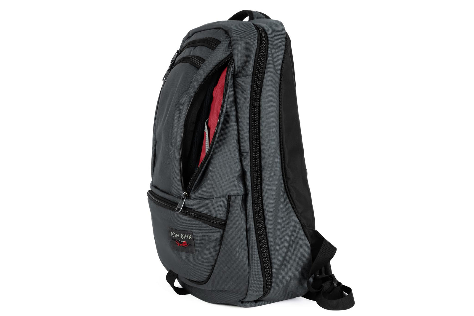 visible variant TB0121-GKSL^^A Nebulous Grey Ballistic Synik 30 with the side pocket open showing the Sangria Cerylon lining color. 
