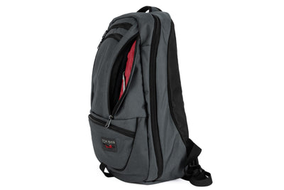 visible variant TB0121-GKSL^^A Nebulous Grey Ballistic Synik 30 with the side pocket open showing the Sangria Cerylon lining color. 