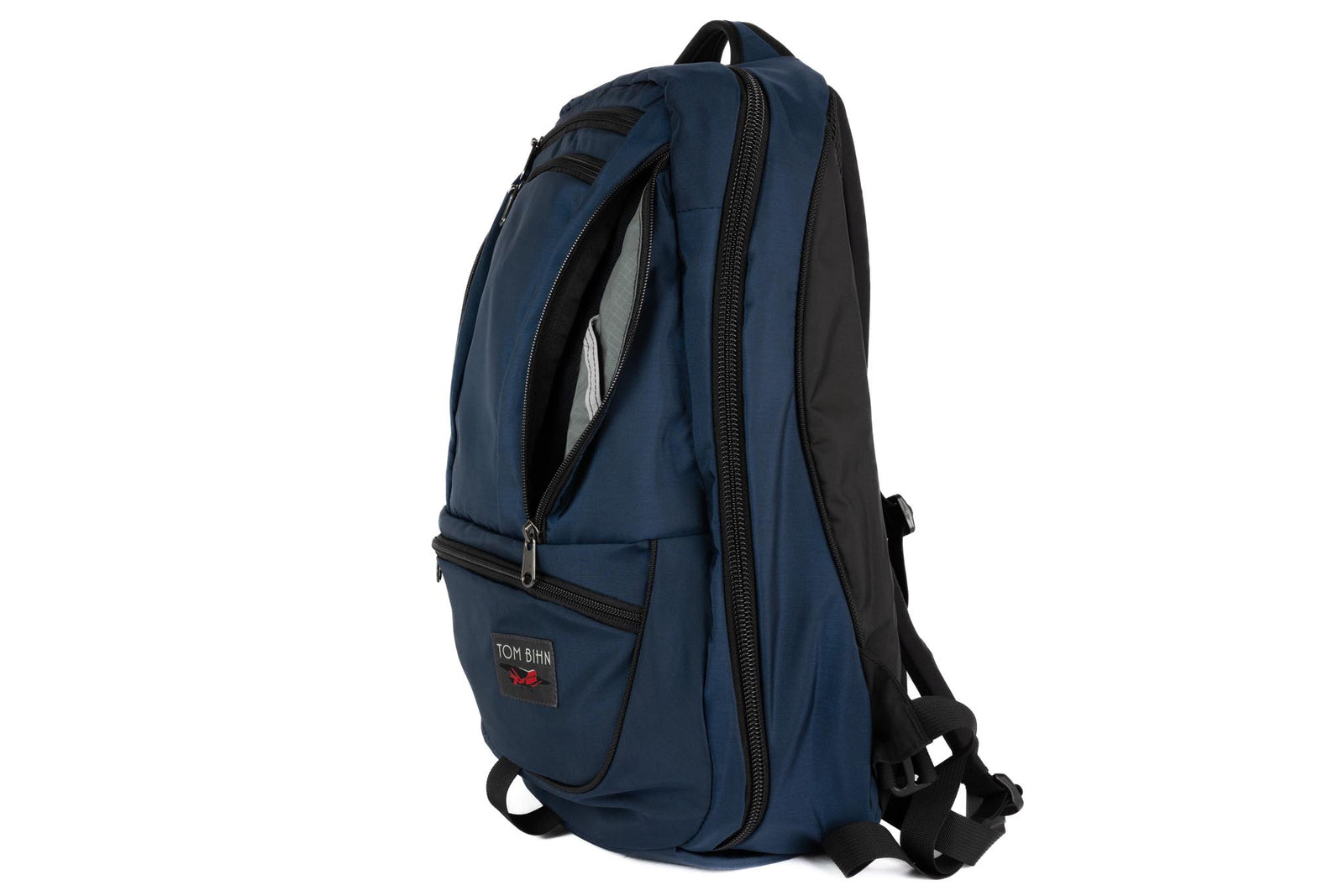visible variant TB0121-NNGL^^The Synik 30 in Navy (dark blue) 420 Parapack with a Mountain Grey (grey with light grey gridding) 210 Cerylon interior.