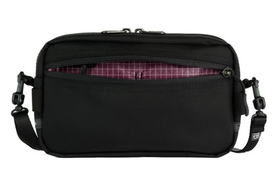visible variant TB0413-BK5D^^A Side Effect in Black Ballistic with Acai (purple with white grid) 200 Halcyon interior.