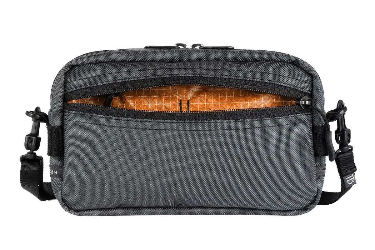visible variant TB0413-GKZD^^A Side Effect in Nebulous Grey (medium grey) Ballistic with Zest (orange with white grid) 200 Halcyon interior.