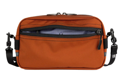 visible variant TB0413-TKDL^^A Side Effect in Burnt Orange 630 Ballistic with Dusk (blue-grey with light blue-grey grid) 210 Cerylon interior.
