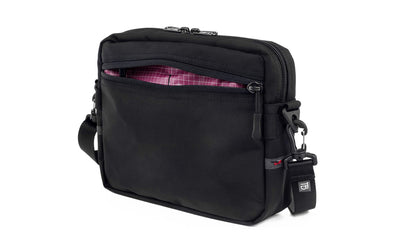 visible variant TB0414-BK5D^^The Side Kick in Black Ballistic with an Acai (dark purple with white grid) 200 Halcyon interior.