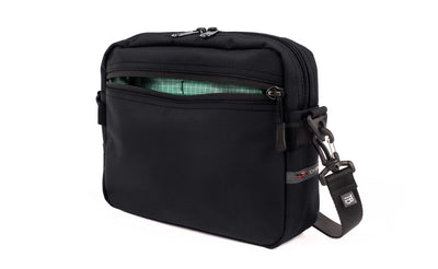 visible variant TB0414-BKGD^^The Side Kick in Black Ballistic with an Seafoam (pale green with white grid) 200 Halcyon interior.