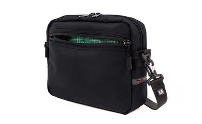 visible variant TB0414-BKKD^^The Side Kick in Black Ballistic with a Sitka (dark green with white grid) 200 Halcyon interior.