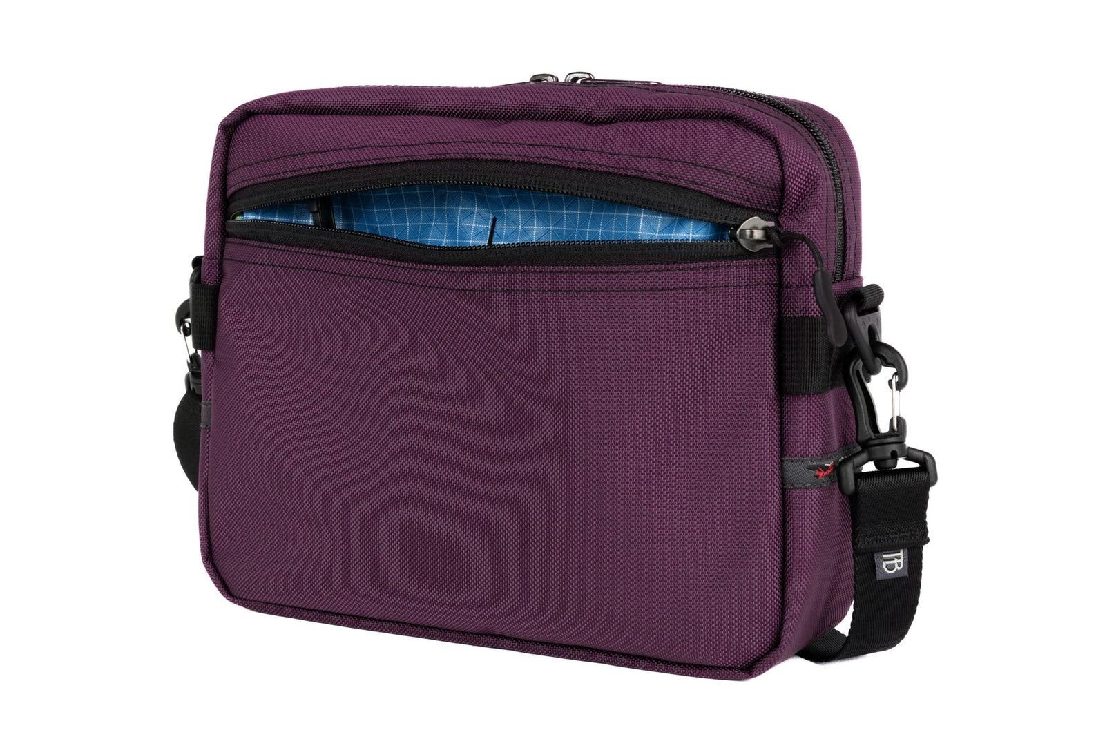 visible variant TB0414-UKLD^^The Side Kick in Aubergine (dark purple) Ballistic with a Island (blue with white grid) 200 Halcyon interior.