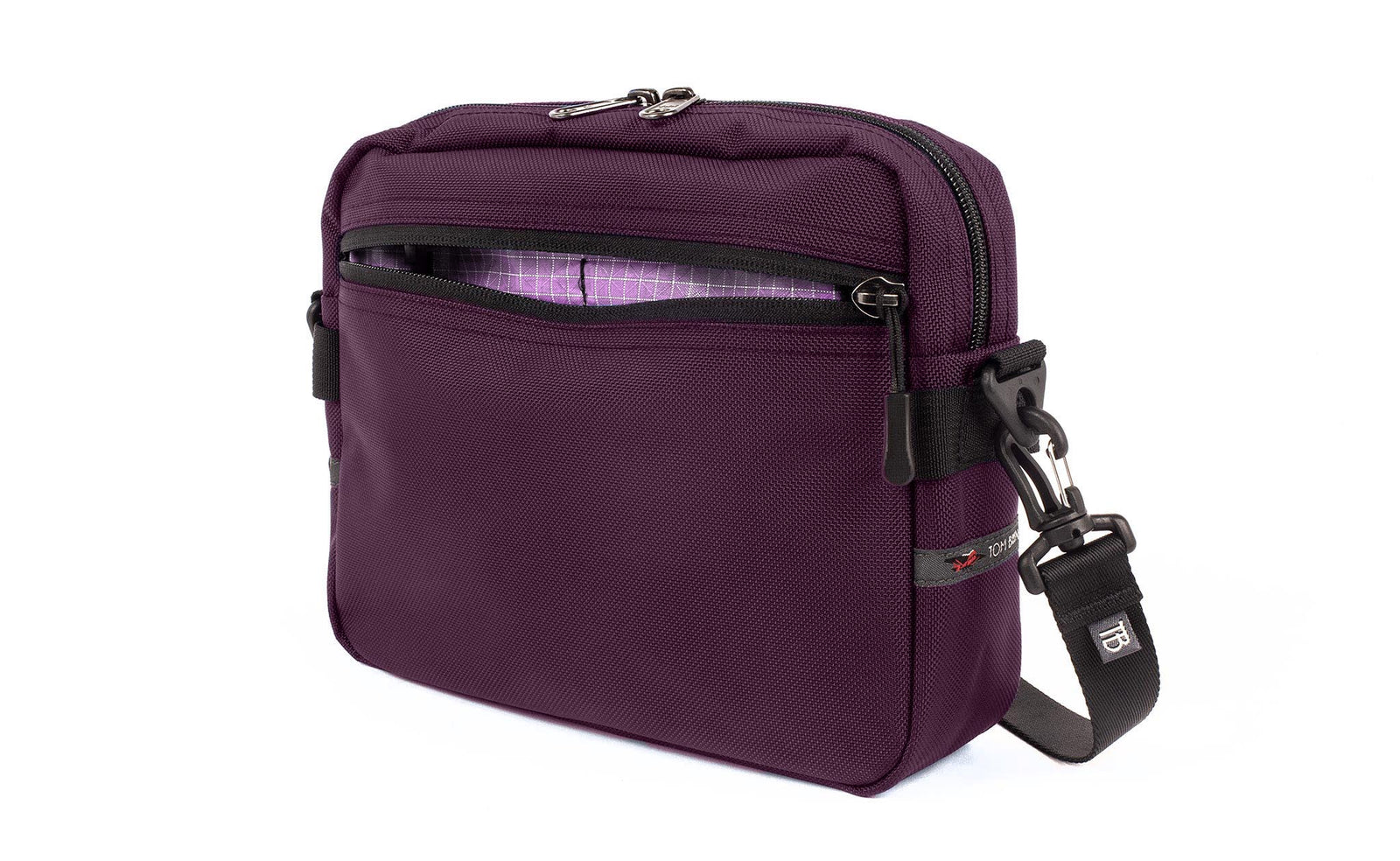 visible variant TB0414-UKYD^^The Side Kick in Aubergine (dark purple) Ballistic with a Wisteria (pale purple with white grid) 200 Halcyon interior.