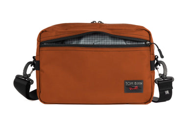visible variant TB0415-TKND^^The Side Hustle in Burnt Orange Ballistic with Northwest Sky (grey) 200 Halcyon interior.