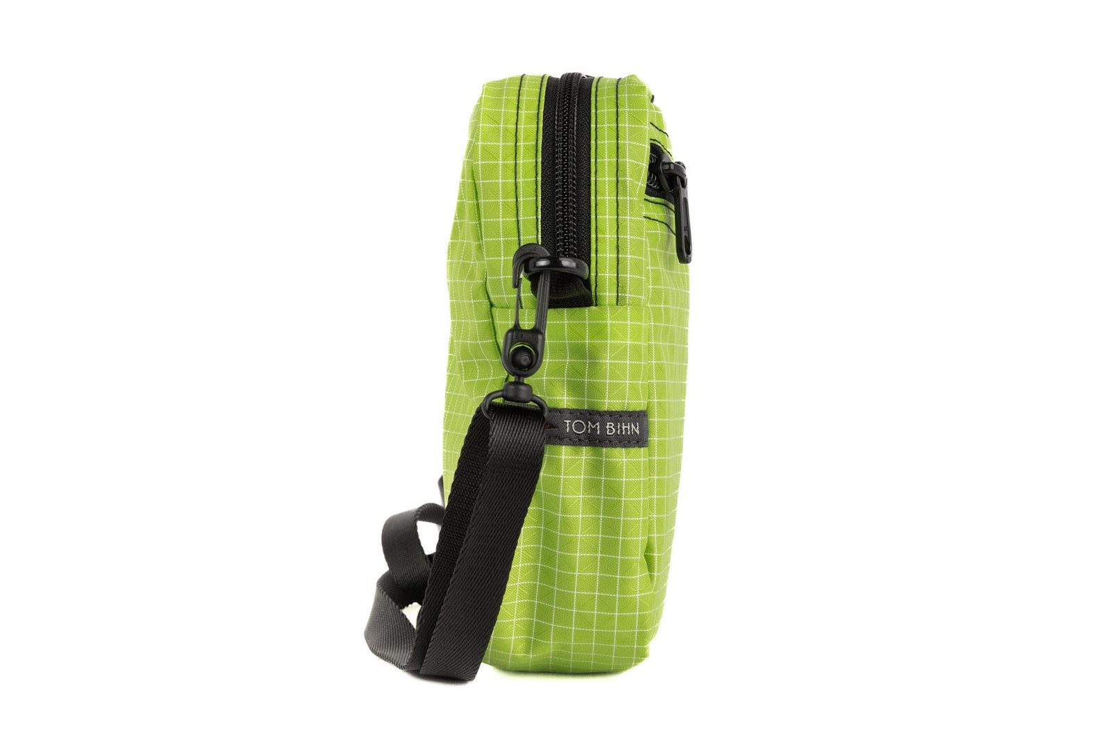 visible variant TB0416-1DGE^^Profile photo of an Everyday Cubelet in Kiwi Halcyon (bright green with a white grid) with a front zipper.