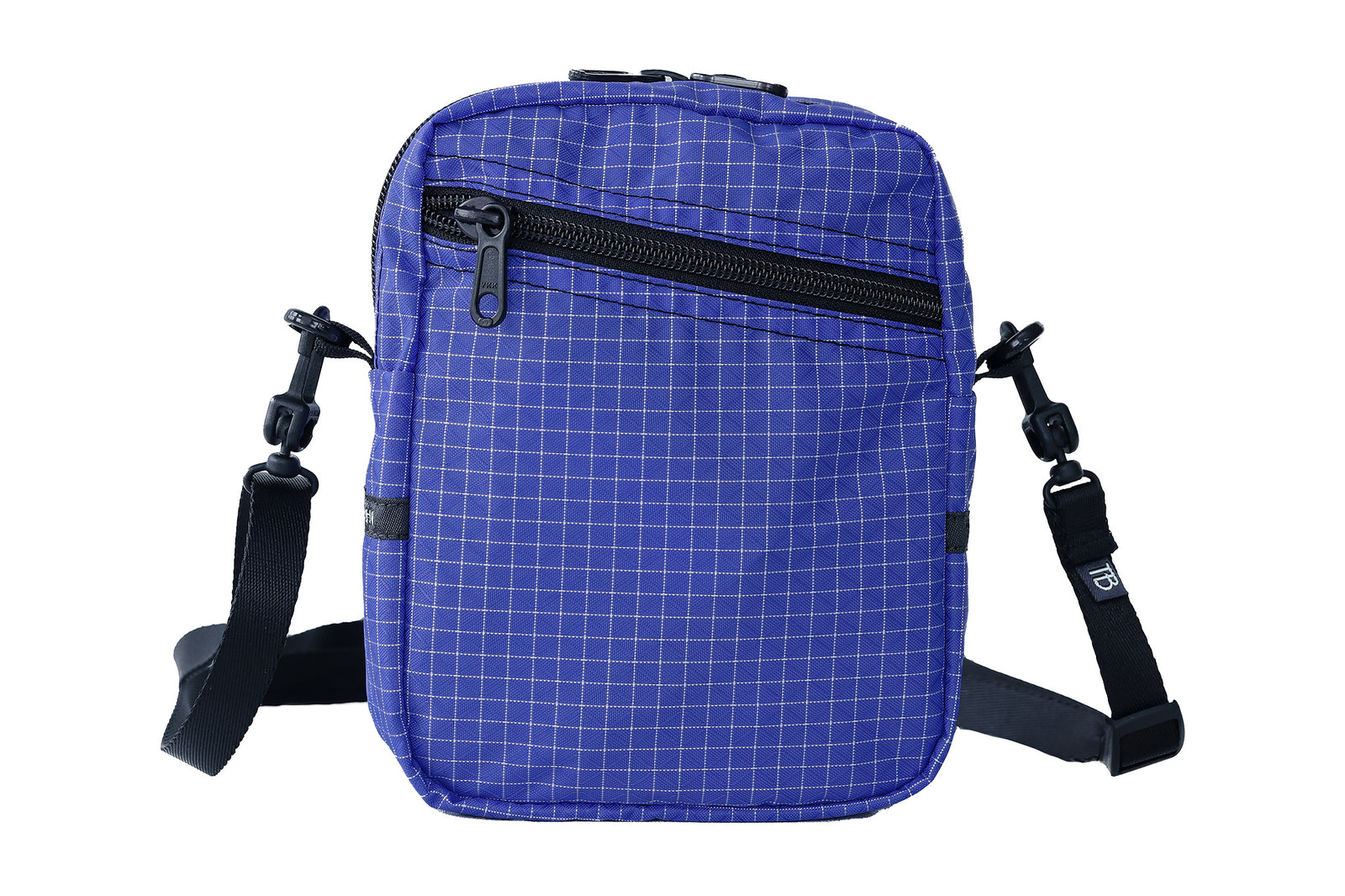 visible variant TB0416-9DGE^^An Everyday Cubelet in Selkie Halcyon (purplish-blue with a white grid) with a front zipper.