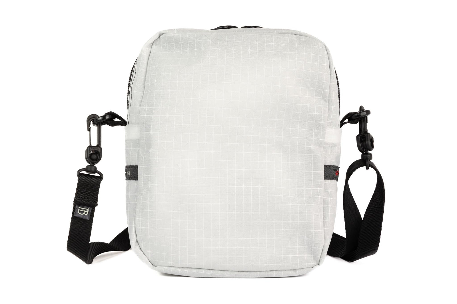 visible variant TB0416-TDGE^^The rear of an Everyday Cubelet in Tahoma Halcyon (white with a white grid) with a front zipper.