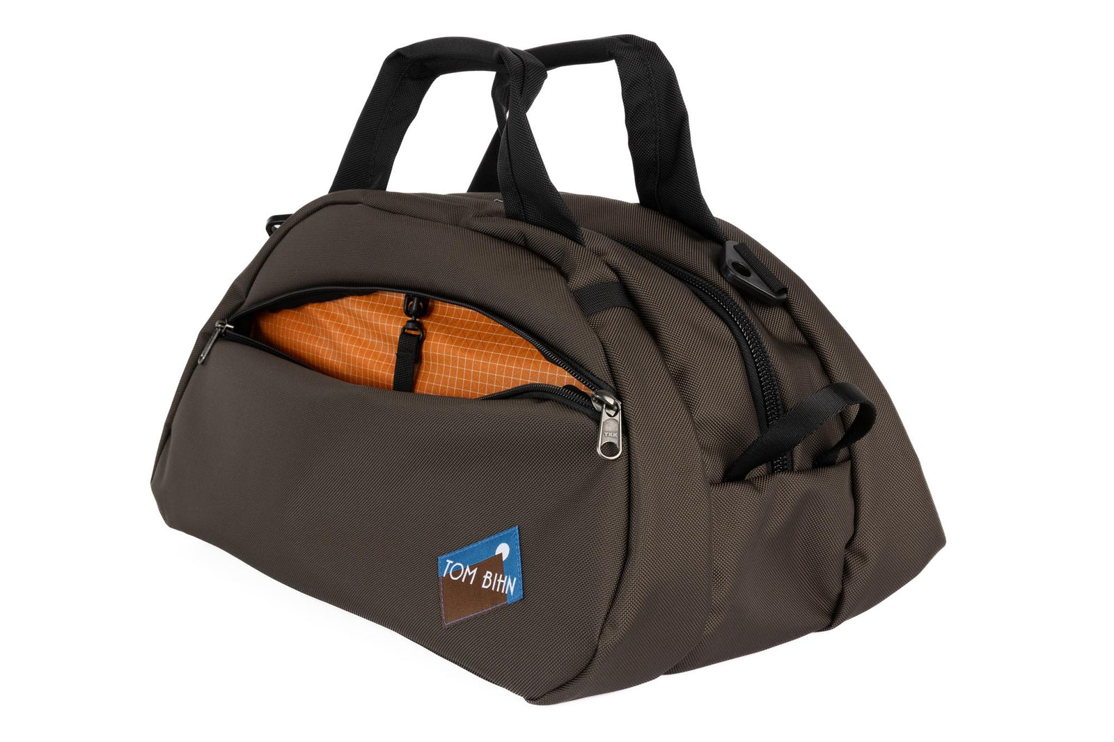 visible variant TB0435-RKZD^^The Old School Carry All in Ursa 630 Ballistic with Zest (orange with white grid) 200 Halcyon interior.