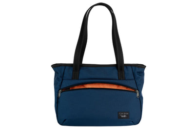 visible variant TB0715-DKZD^^Photo of the Nomad Tote in Deep Blue Ballistic with Zest (orange with white grid) 200 Halcyon interior.
