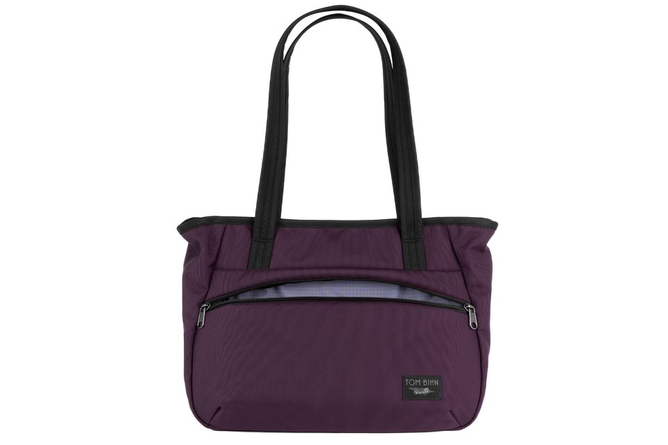 visible variant TB0715-UKDL^^Photo of the Nomad Tote in Aubergine Ballistic with dusk (bluish-purple with light bluish-purple grid) 210 Cerylon interior.