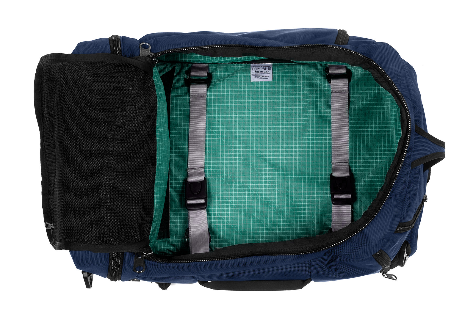 visible variant TB0902-DKED^^ A Techonaut 30 with a Deep Blue (dark blue) exterior with Kelpie (bluish-green with white grid pattern) 200 Halcyon interior.