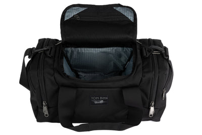 visible variant TB0904-BKND^^The Night Flight Travel Duffel in Black Ballistic with a Northwest Sky 210 Cerylon interior.