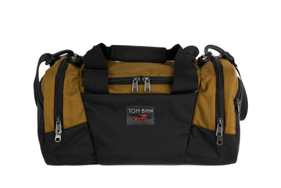visible variant TB0904-CKGL^^The Night Flight Travel Duffel in Coyote Ballistic.
