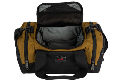 visible variant TB0904-CKGL^^The Night Flight Travel Duffel in Coyote Ballistic with a Mountain Grey 210 Cerylon interior.
