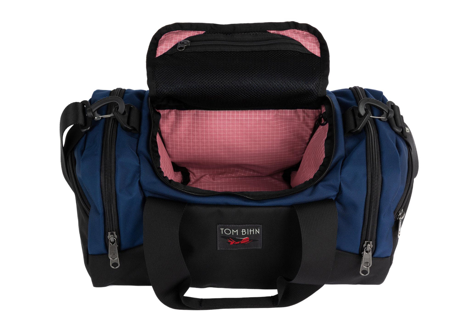 visible variant TB0904-DK4D^^The Night Flight Travel Duffel in Deep Blue Ballistic with a Sakura 200 Halcyon interior.