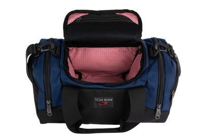 visible variant TB0904-DK4D^^The Night Flight Travel Duffel in Deep Blue Ballistic with a Sakura 200 Halcyon interior.