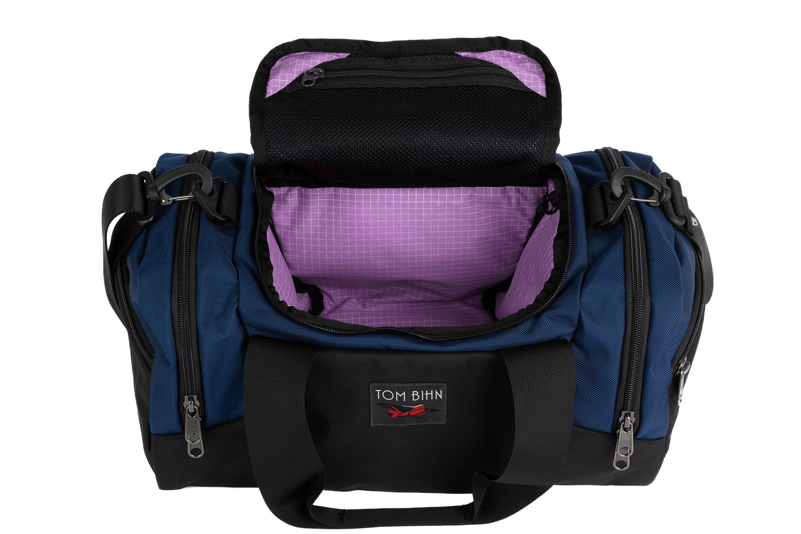 visible variant TB0904-DKYD^^The Night Flight Travel Duffel in Deep Blue Ballistic with a Wisteria 200 Halcyon interior.