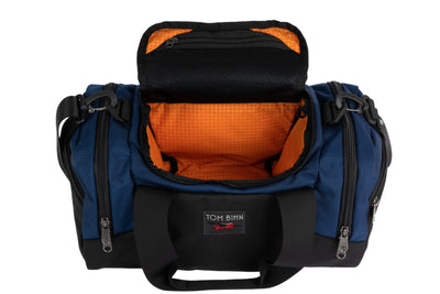 visible variant TB0904-DKZD^^The Night Flight Travel Duffel in Deep Blue Ballistic with a Zest 200 Halcyon interior.