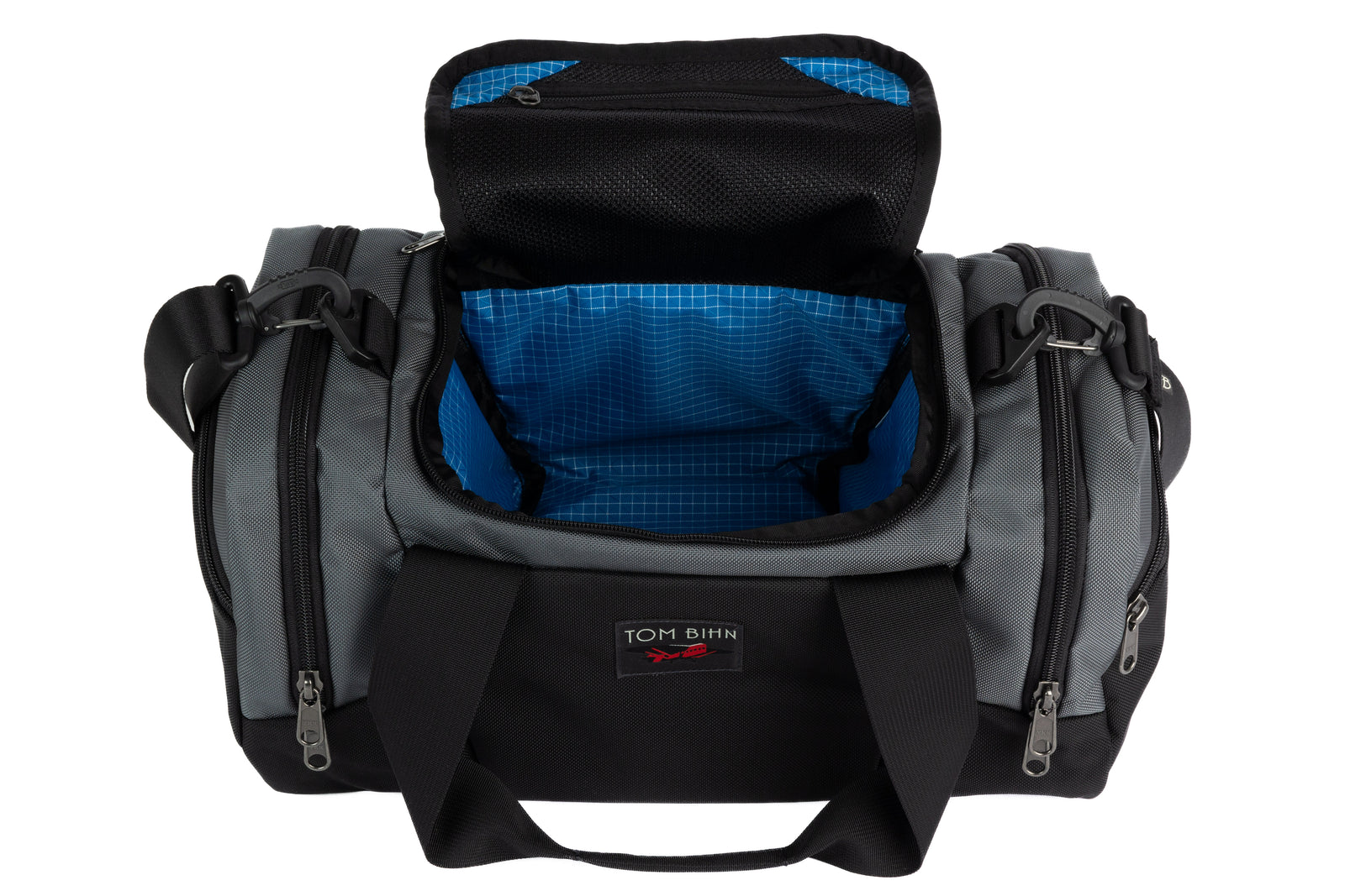 visible variant TB0904-GKLD^^The Night Flight Travel Duffel in Nebulous Grey Ballistic with an Island 200 Halcyon interior.