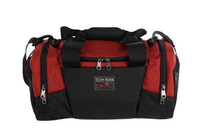 visible variant TB0904-MKND^^The Night Flight Travel Duffel in Mars Red Ballistic.