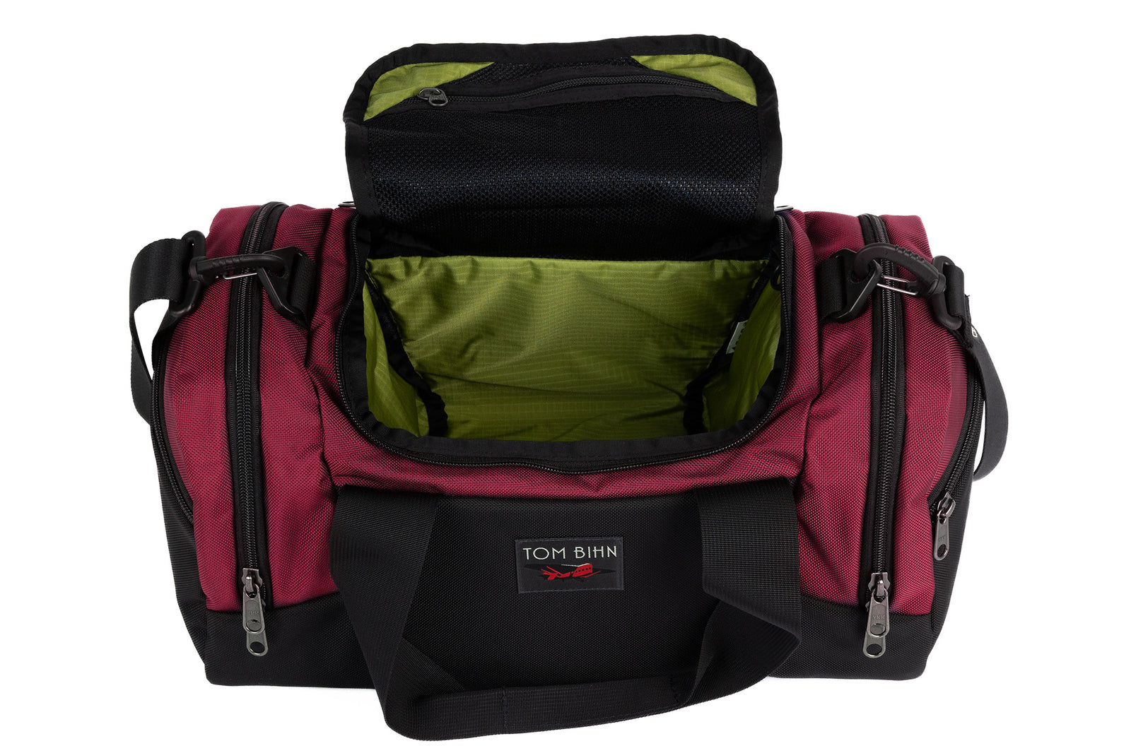 visible variant TB0904-PKML^^The Night Flight Travel Duffel in Raspberry Ballistic with a Moss 210 Cerylon interior.