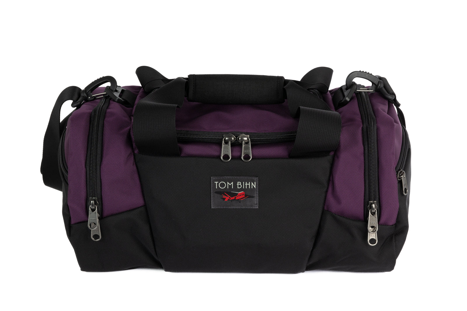 visible variant TB0904-UK7D TB0904-UK5D TB0904-UKGD TB0904-UKWD TB0904-UKDL^^The Night Flight Travel Duffel in Aubergine Ballistic.