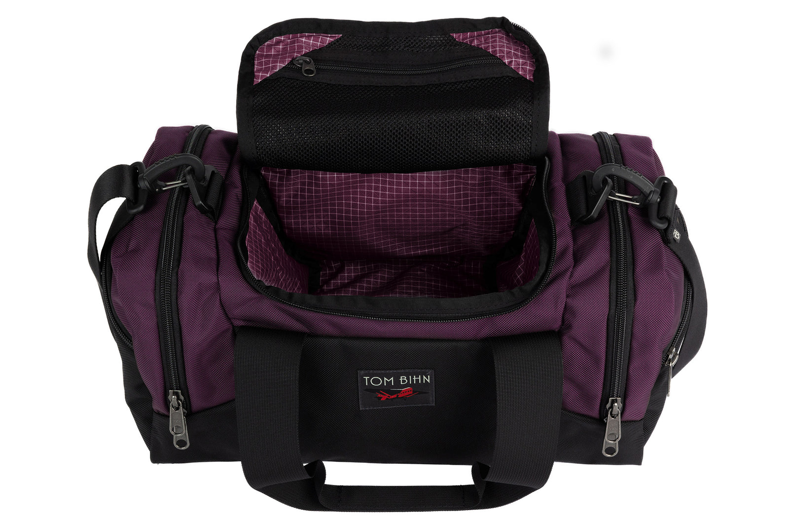 visible variant TB0904-UK5D^^The Night Flight Travel Duffel in Aubergine Ballistic with a Acai 200 Halcyon interior.