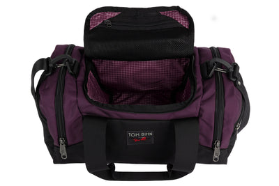 visible variant TB0904-UK5D^^The Night Flight Travel Duffel in Aubergine Ballistic with a Acai 200 Halcyon interior.