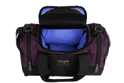 visible variant TB0904-UK9D^^The Night Flight Travel Duffel in Aubergine Ballistic with a Selkie 200 Halcyon interior.