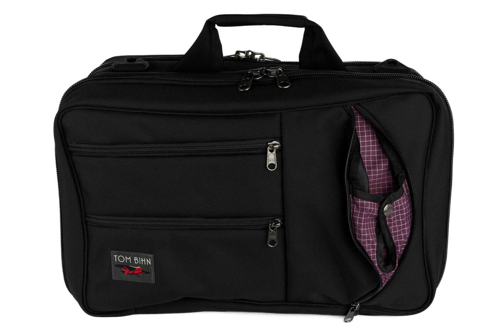 visible variant TB0952-BB5D^^A Western Flyer in Black 1050 Ballistic with a Acai 200 Halcyon (dark purple with white grid) interior.