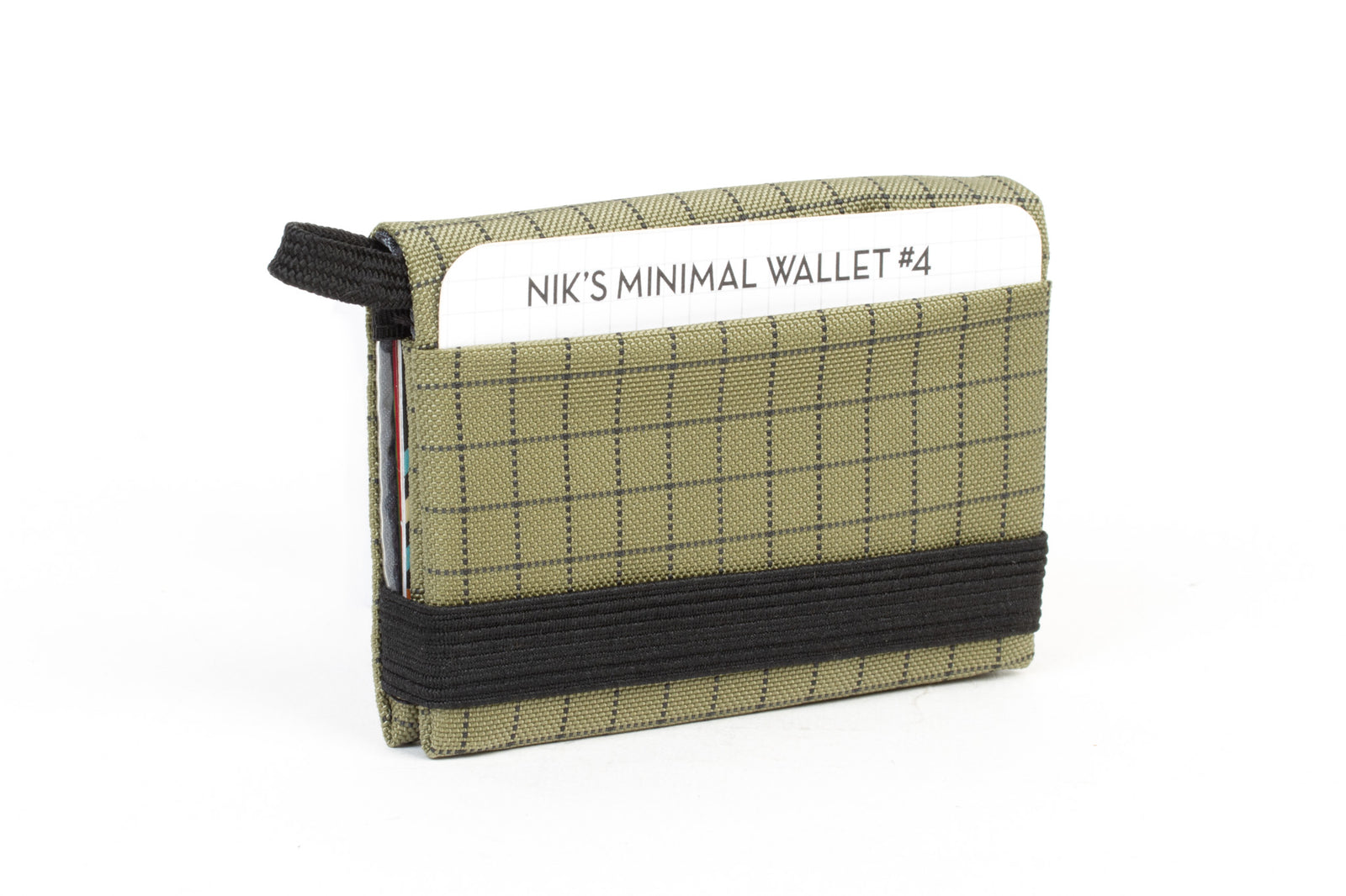 visible variant TB1280-VH^^The Size 4 Nik's Minimalist Wallet in Taiga (olive green with grey grid) 400 Halcyon closed with the attached elastic band.