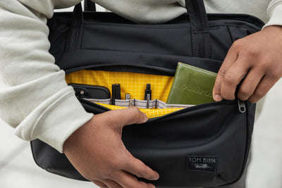 visible lifestyle^^A nomade showing the pockets in its front compartment.