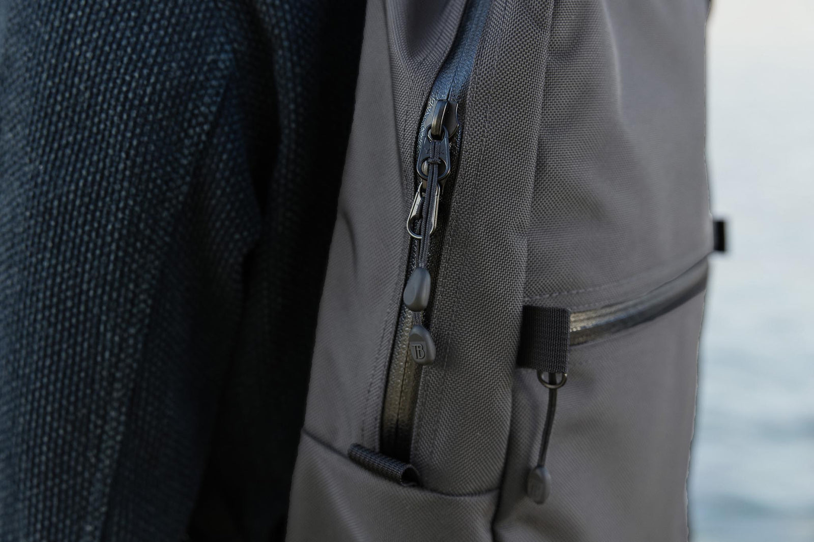 Close shot of the zipper pulls on the Paragon 2.0