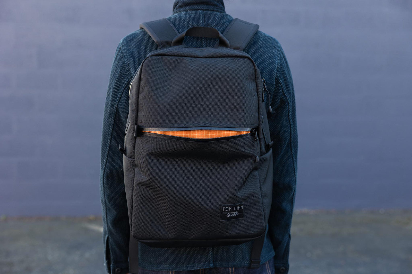 visible detail^^Paragon with front pocket open, bright orange interior