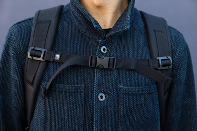 visible detail^^Close shot of a person wearing the sternum strap of the Paragon 2.0