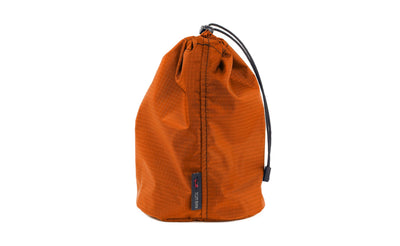 visible variant TB1253-PL^^A Size 3 Persimmon (dark orange with orange grid) 210 Cerylon Travel Stuff Sack.