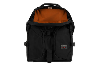 visible variant TB0114-BKPL^^The Brain Bag in Black Ballistic with the front main compartment zipper opened to reveal its Persimmon (dark orange with light orange grid) 210 Cerylon interior.
