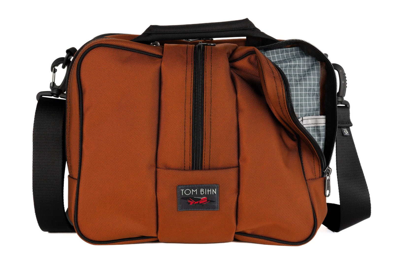 visible variant TB0967-TKND^^Co-Pilot in Burnt Orange/Northwest Sky.