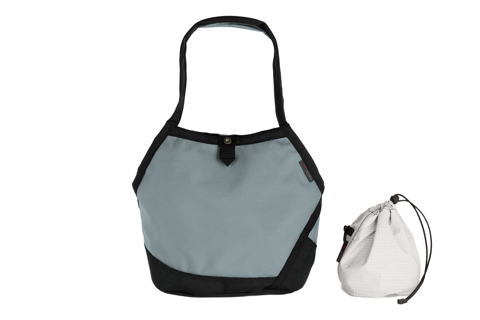 visible variant TB0660-LKTD^^A Swift in Cloud Ballistic with Tahoma (white with white grid) 200 Halcyon interior and Yarn Stuff Sack.