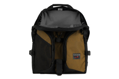visible variant TB0114-CKGL^^The Brain Bag in Coyote (light brown) Ballistic with the front main compartment zipper opened to reveal its Mountain Grey (grey with light grey grid) 210 Cerylon interior.
