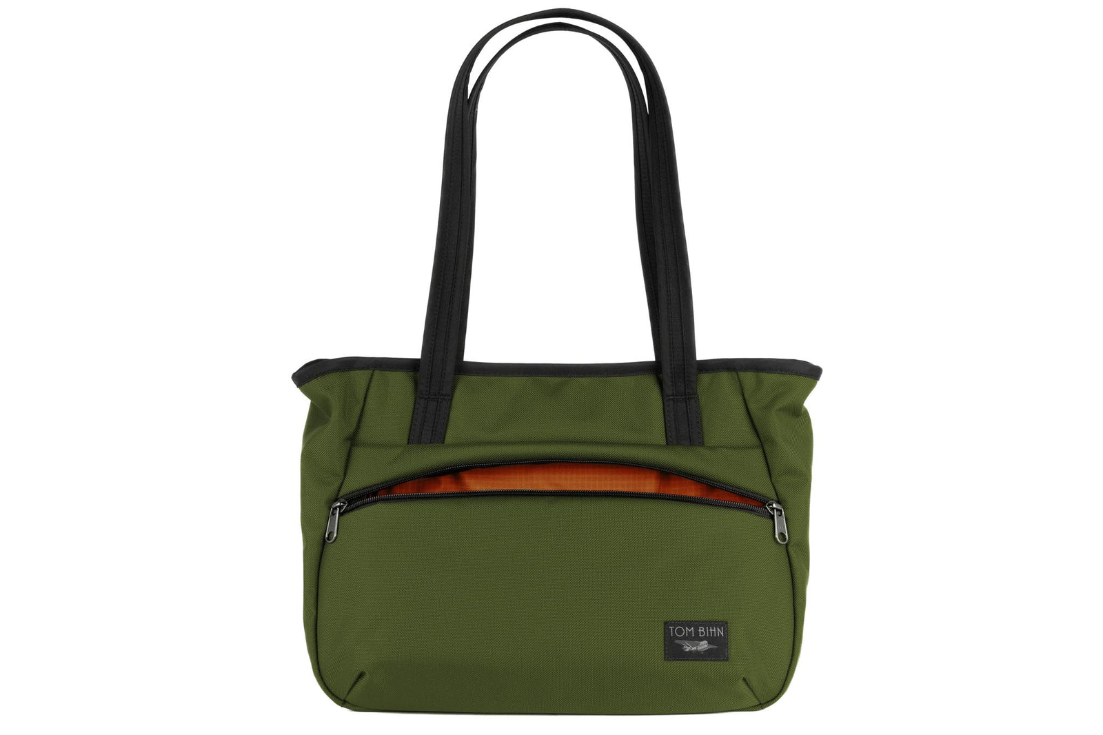 visible variant TB0715-VKPL^^Photo of the Nomad Tote in Saguaro (olive green) Ballistic with Persimmon (dark orange with orange grid) 210 Cerylon interior.