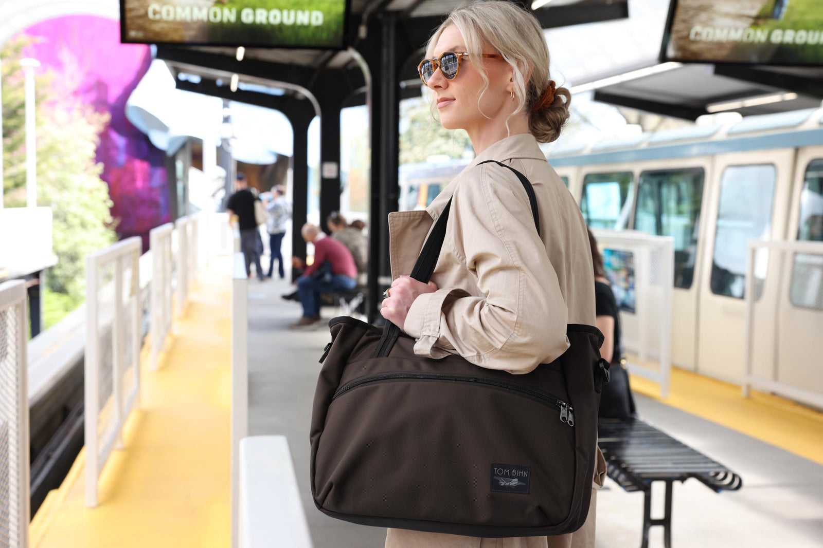 visible lifestyle^^A person on the Seattle Monorail platform with the Nomad 16