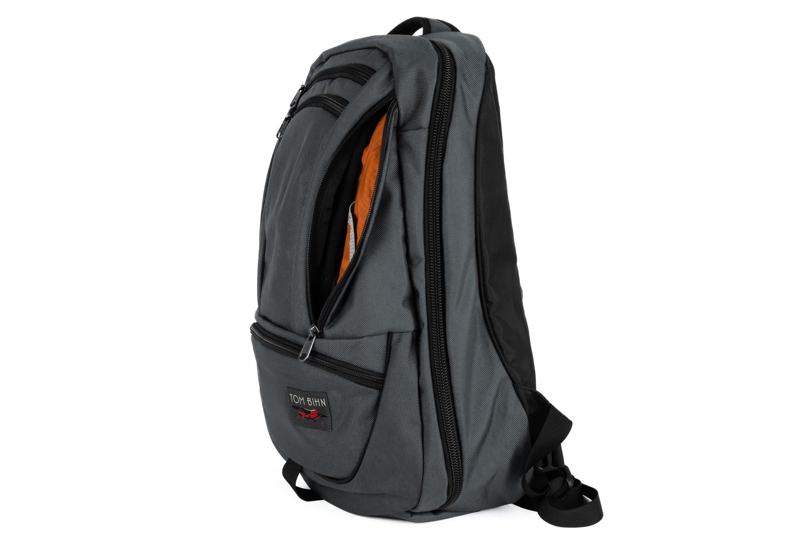 visible variant TB0121-GKPL^^A Nebulous Grey Ballistic Synik 30 with the side pocket open showing the Persimmon Cerylon lining color. 