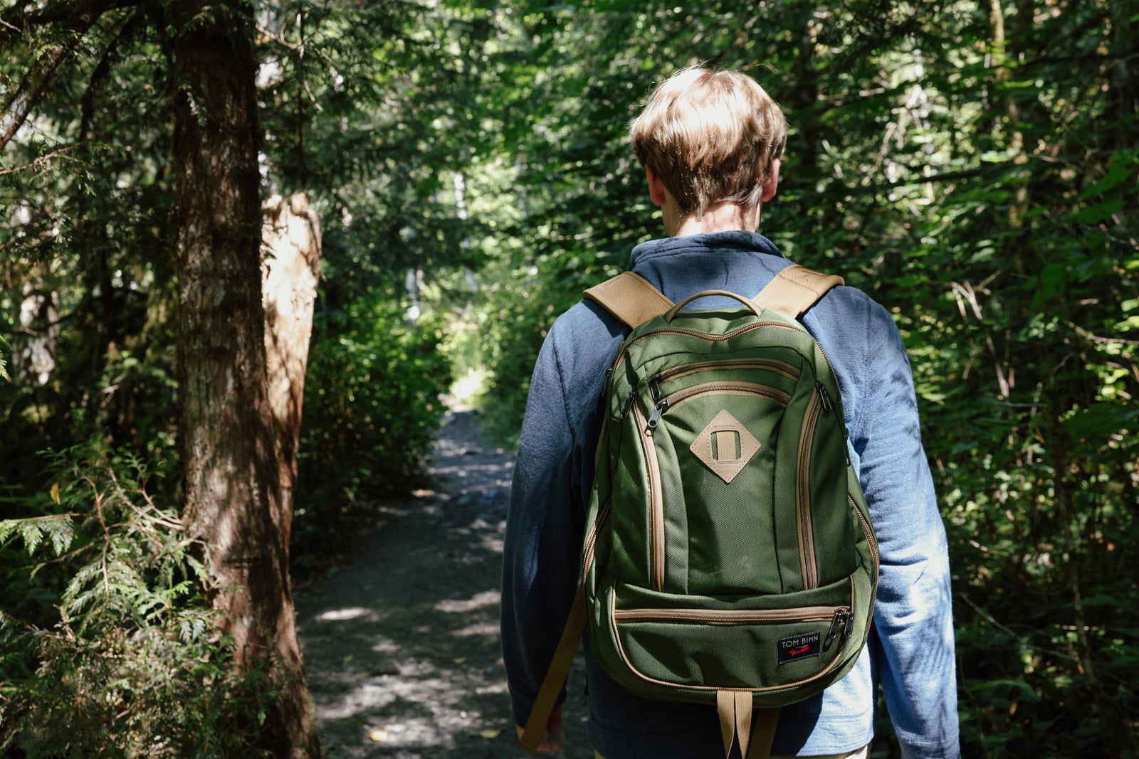 visible lifestyle^^Person hiking with their Synik 26